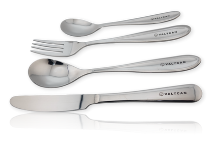 Set of Valtcan cutlery including spoon, fork, and knives on a white background