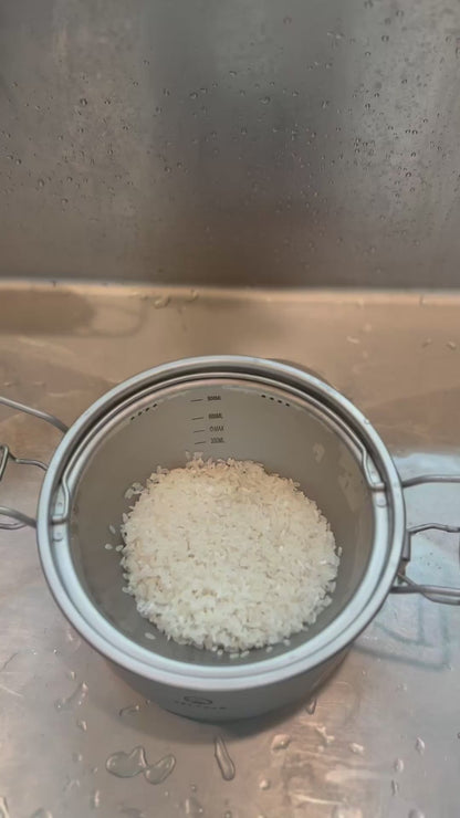 Titanium Rice Cooker 2000ml Perfect Rice Over Any Flame · 605g · Feeds 2-4